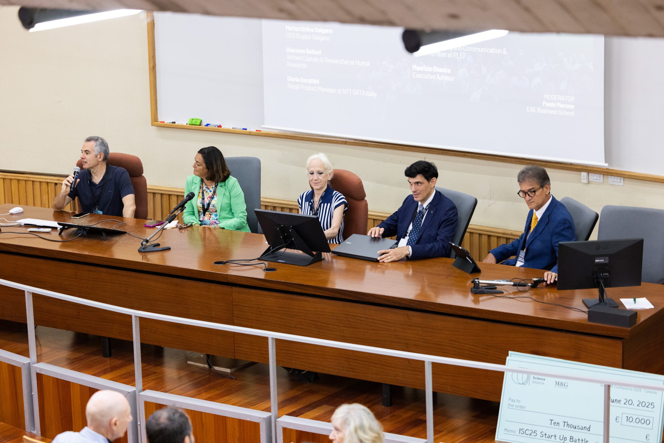 Photo of a conference speakers